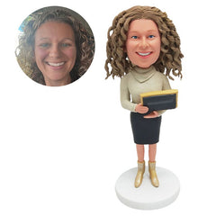 customised bobble head figure female colleague holding a board