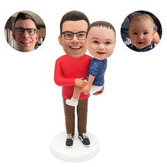 customised bobbleheads figures kind father holding a lovely baby