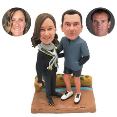 custom made travelers hiker bobble heads figures travel couple with arms around each other