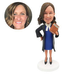 custom bobblehead figure female lawyer holding a law book