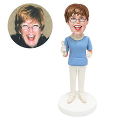 customised bobblehead figure female dentist holding a dental forcep