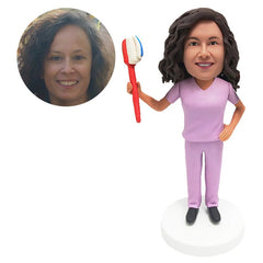 customized bobblehead figure dentist holding a toothbrush