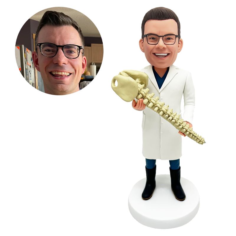 custom made bobblehead figure male doctor holding a vertebra