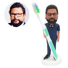 custom made bobblehead figurine male dentist holding a toothbrush