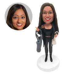 custom bobblehead figure fashion lady making yeah gesture with two bags