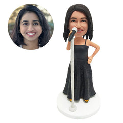 custom bobblehead figure female singer holding a microphone