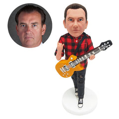 customised bobblehead figure casual man making rock and roll gesture with a guitar