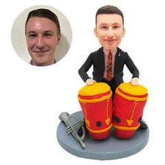 customized bobblehead figure drummer beating a conga drum