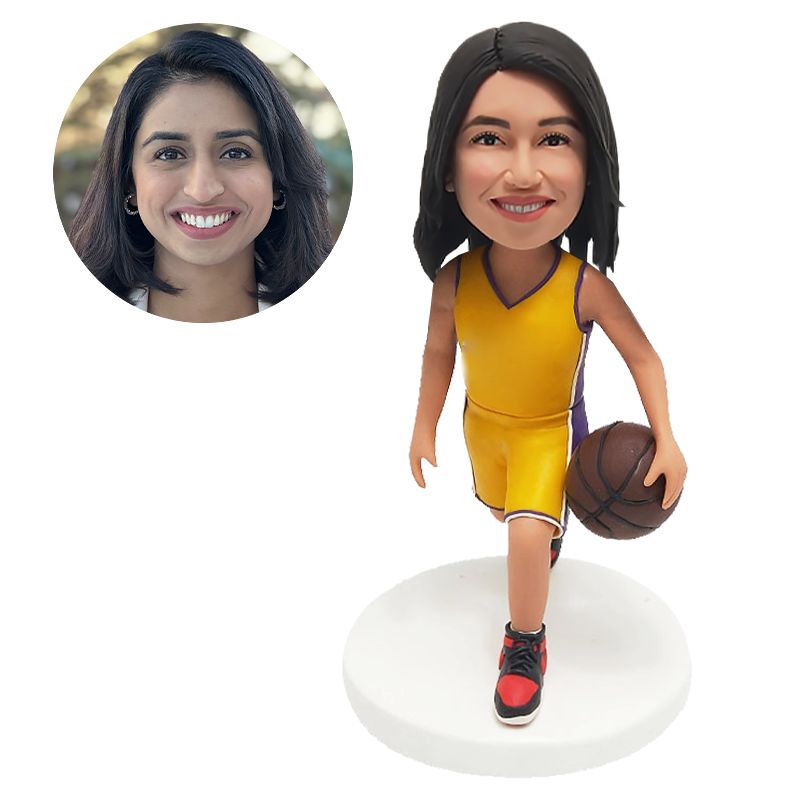 customised bobble head figure basketball female player holding a basketball on the hip