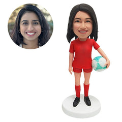 custom made bobble head figure female player holding a ball