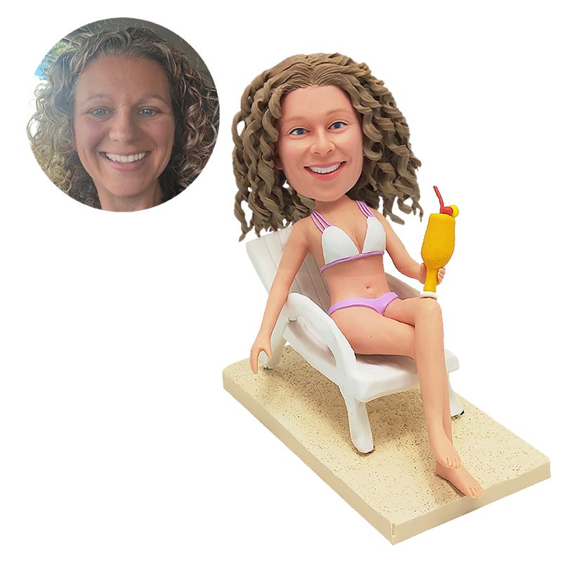 customized bobblehead bikini lady lie on a beach chair