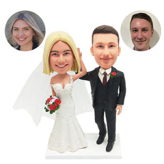 customised bobbleheads figures wedding couple holding hands with each other